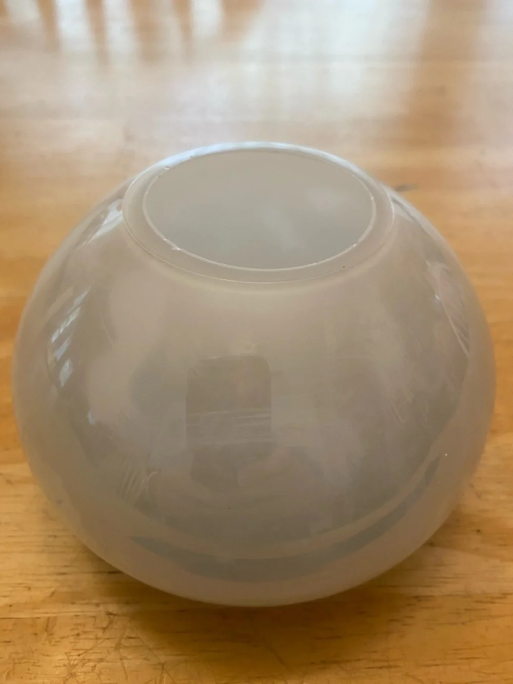 Crate & Barrel Pearlized light green glass globe vase about 5x3